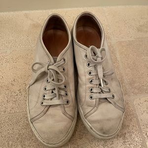 Common project tennis shoes made to look worn